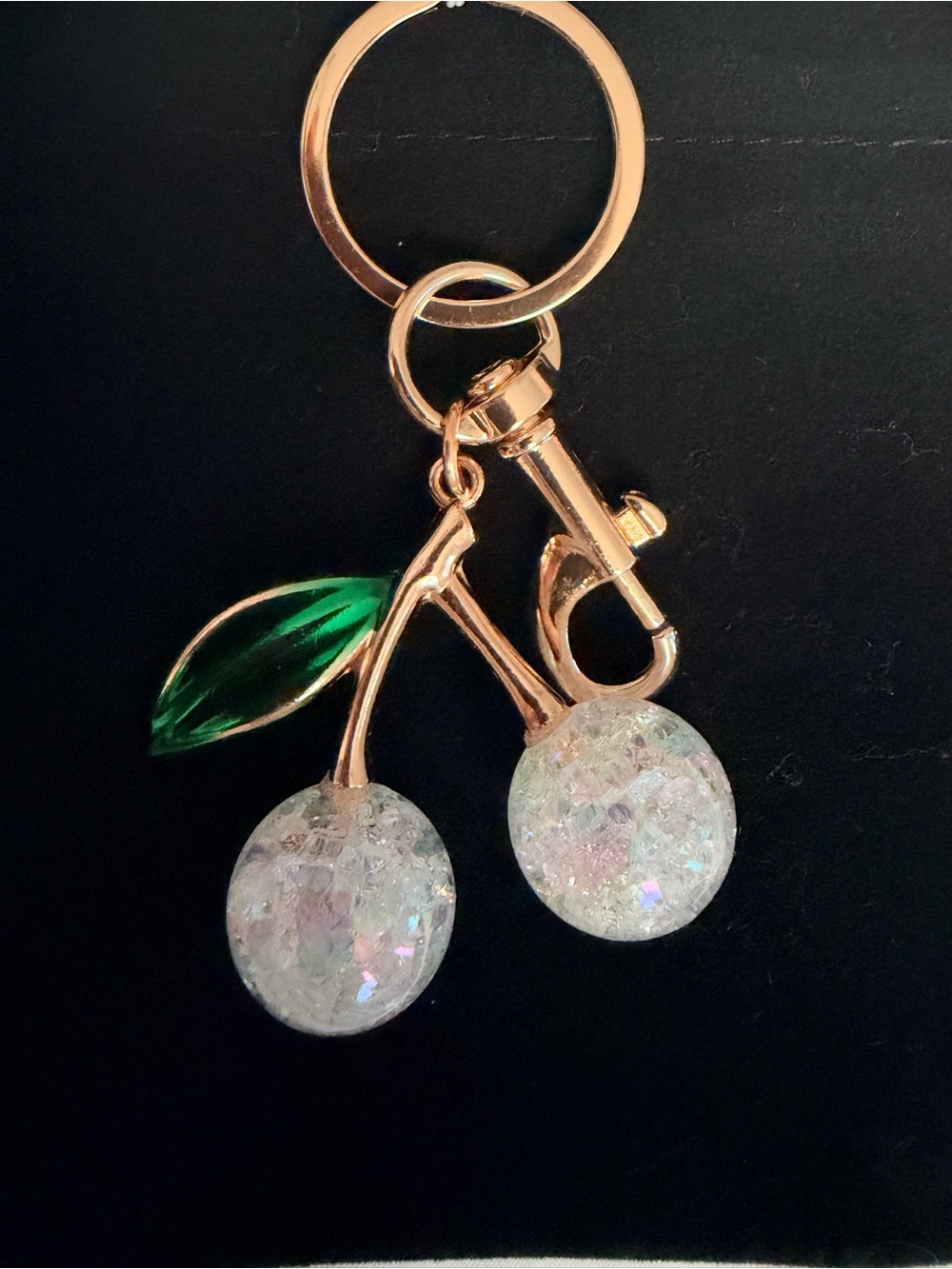 Gold-Tone Cherry Keychain with Green Leaf Accent